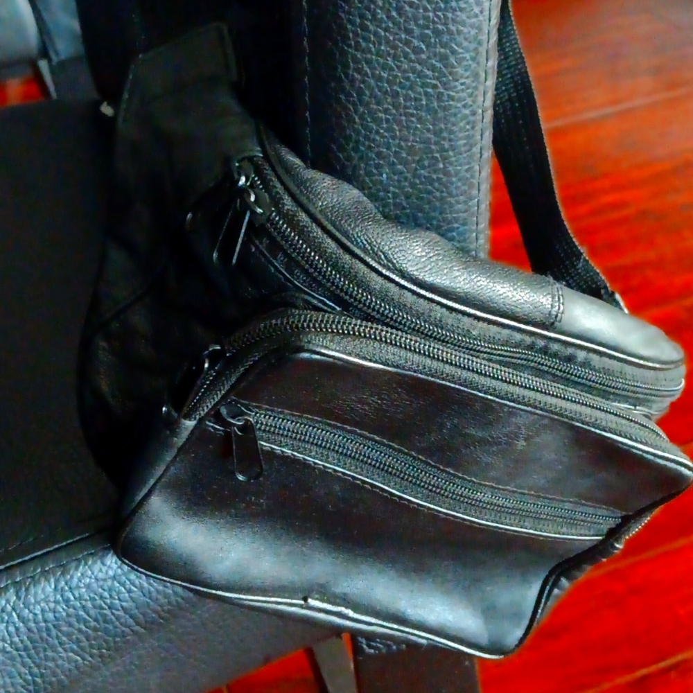 Like new black genuine leather waist pouch/fanny pouch
